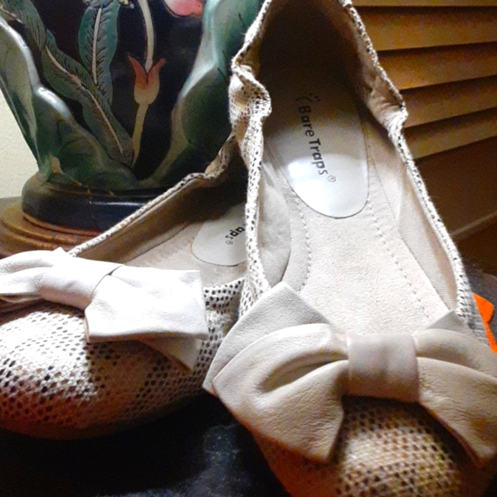 Slip ons ballerina style/cut with bow embellishments on toe